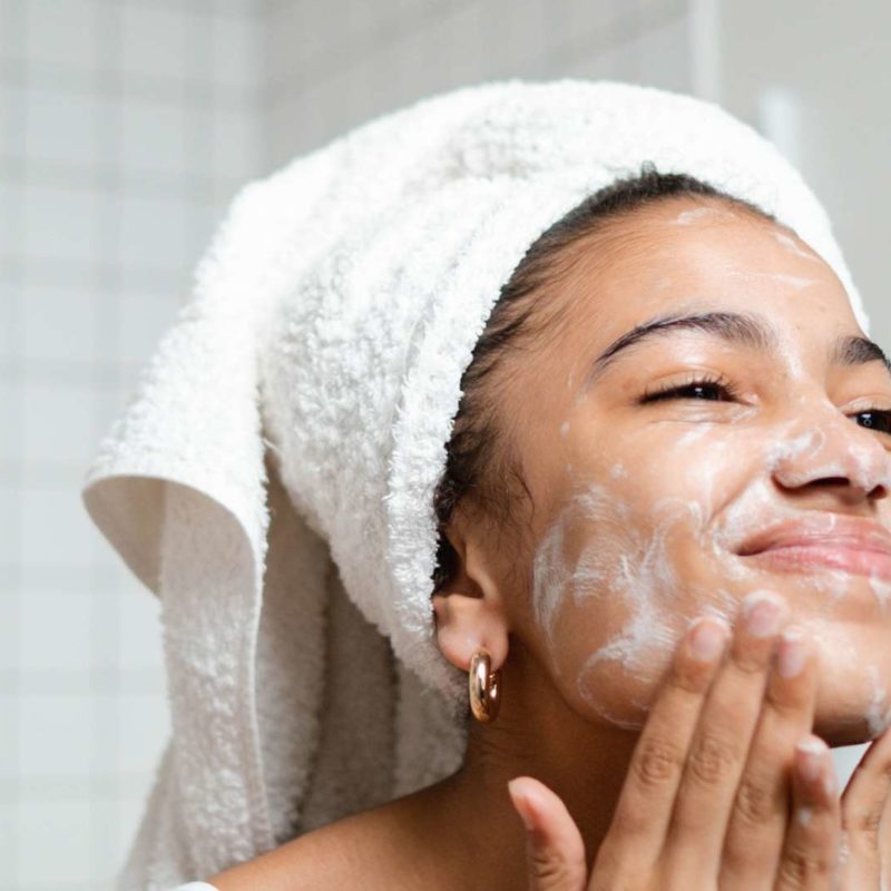 Teenage Girl washing her face