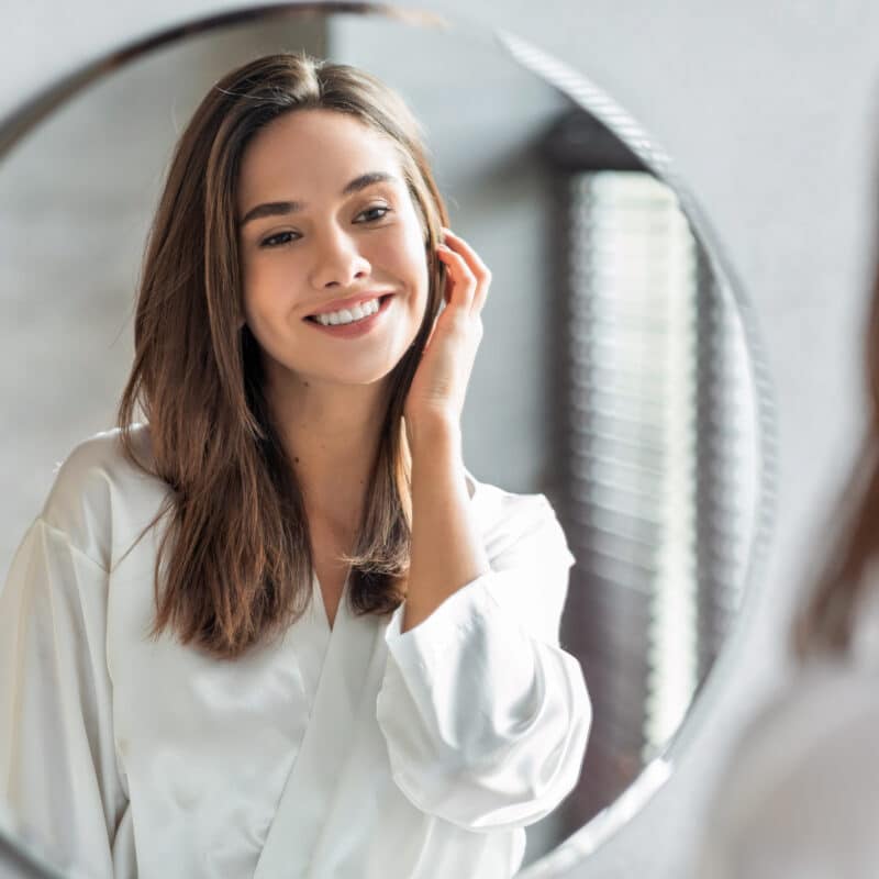 girl stare mirror